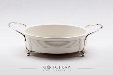 White round porcelain plate with silver plated stand