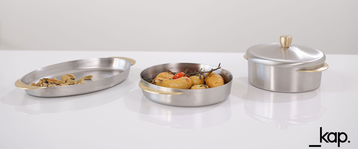 Topkapi- Brushed Stainless steel tableware with brass handles bowls, pots and oval plates